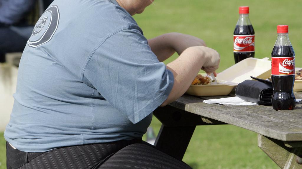 La part de Suisse en surpoids ou obèse a atteint 40%, selon l'OFS. [AP/Keystone - Kirsty Wigglesworth]