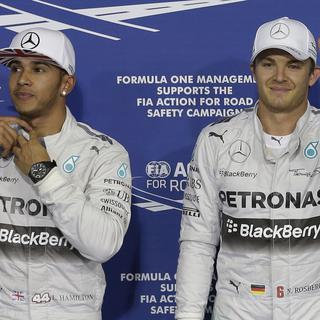 Lewis Hamilton et Nico Rosberg. [Hassan Ammar - AP Photo]
