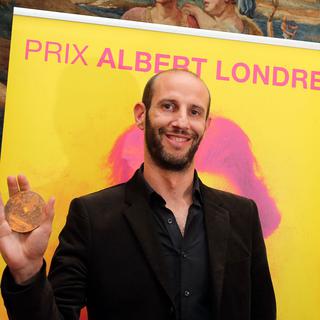 Philippe Pujol remporte le prix Albert Londres 2014. [Nicolas Tucat]
