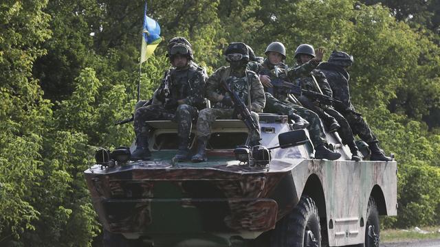 L'armée ukrainienne affirme avoir repéré une colonne d'une centaine de véhicules à 80 kilomètres de Donetsk. [Sergei Grits]