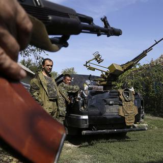 Des rebelles pro-russes à Donetsk. [AP Photo/Sergei Grits]