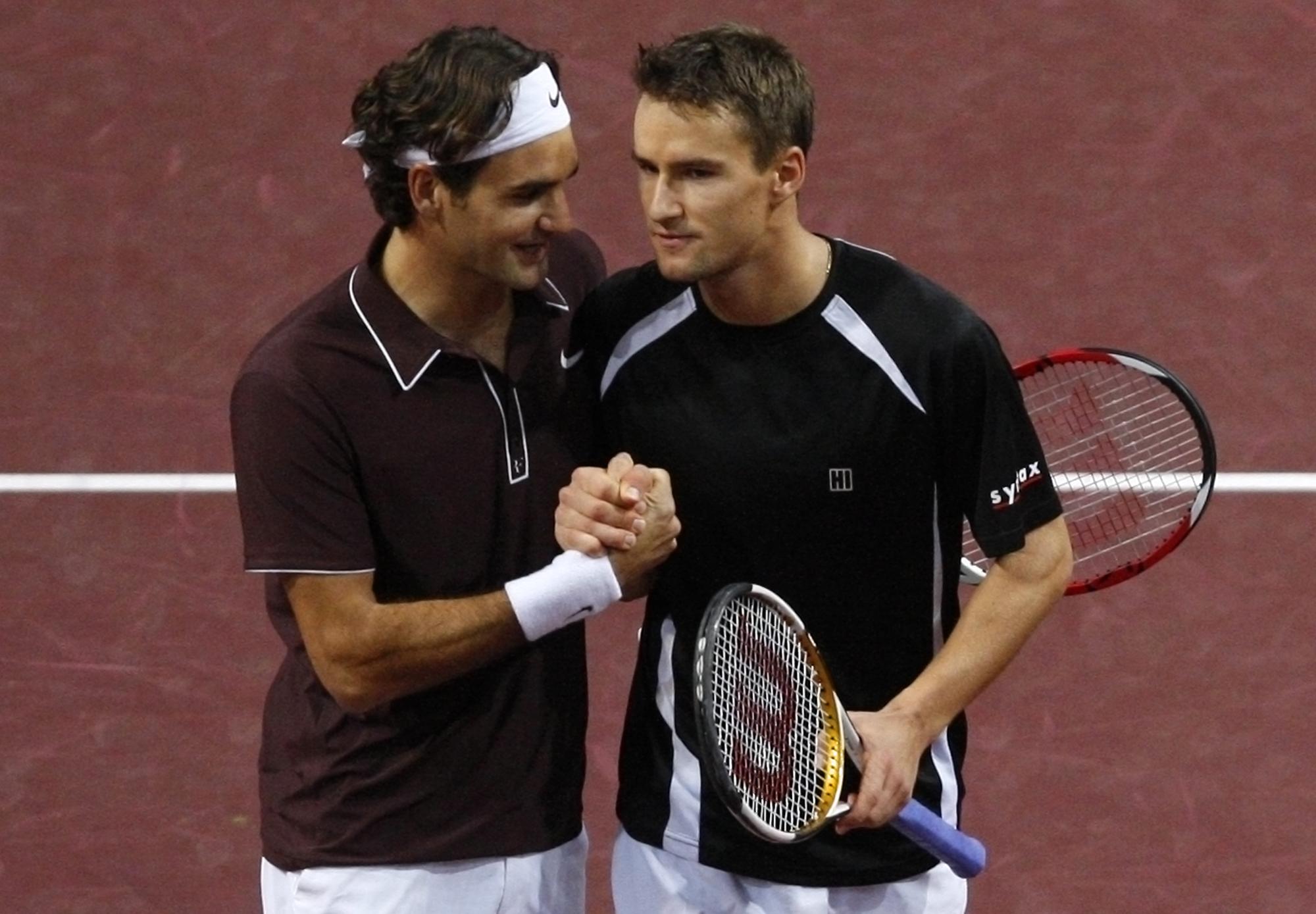 Federer et Chiudinelli sont amis dans la vie. [REUTERS - © Christian Hartmann / Reuters]
