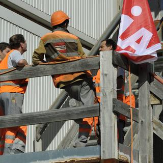 De nombreux cas de dumping salarial sur des chantiers ont été constatés en Suisse. [Steffen Schmidt]