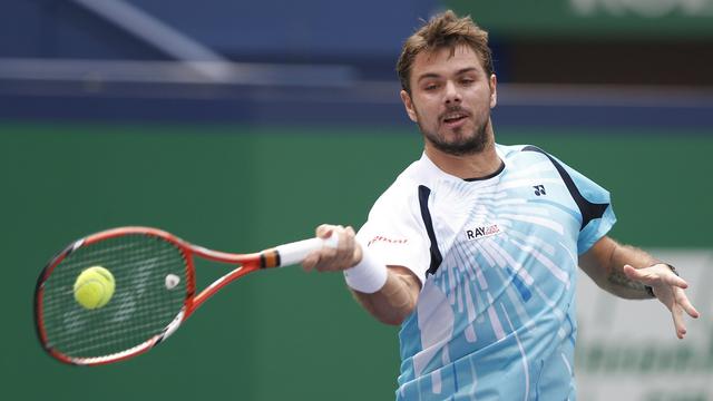 Les choses ont bien commencé pour Stan Wawrinka, associé à Leander Paes. [Vincent Thian]