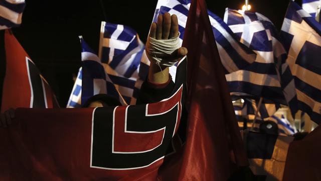 Des militants du parti Aube Dorée à Athènes en novembre 2013. [Yorgos Karahalis]