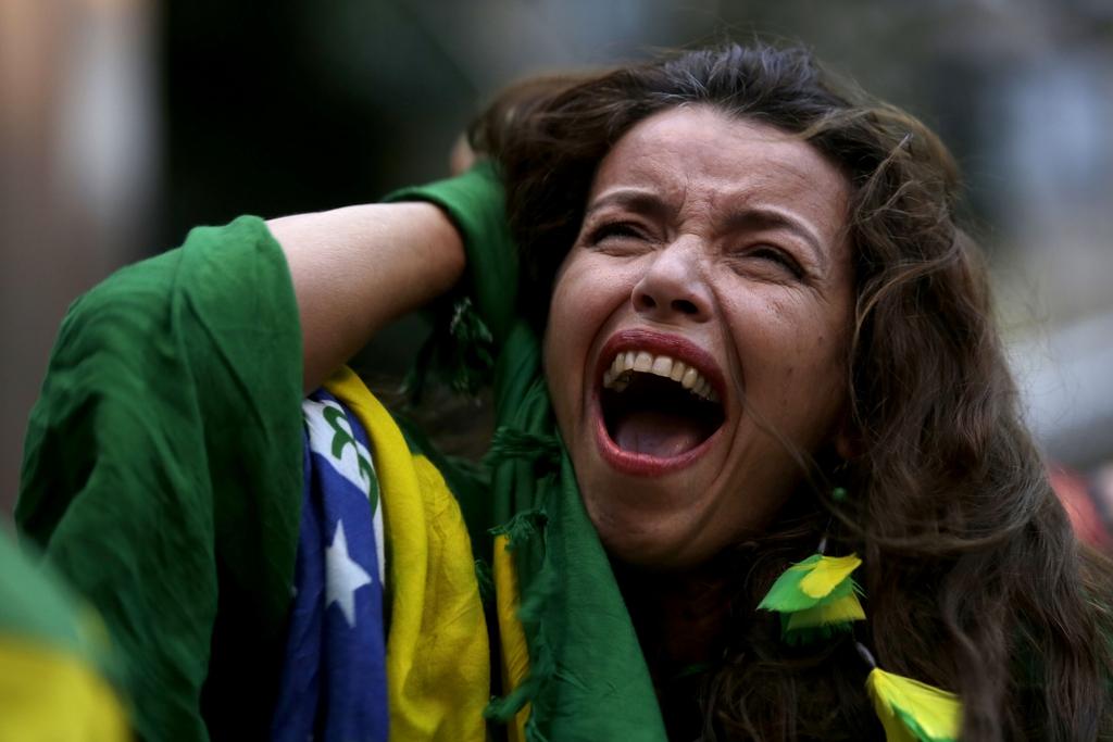 Les supporters brésiliens ont vécu un véritable calvaire mardi soir. [Keystone - Bruno Magalhaes]