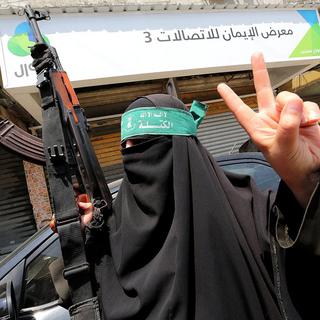 Une femme du Hamas lors d'une manifestation à Jérusalem vendredi. [EPA/Mohammed Saber]