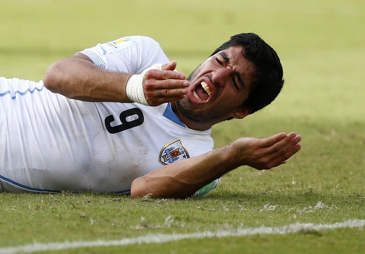 L'épisode de la morsure de Luis Suarez restera un moment important de ce Mondial. [REUTERS - Tony Gentile]