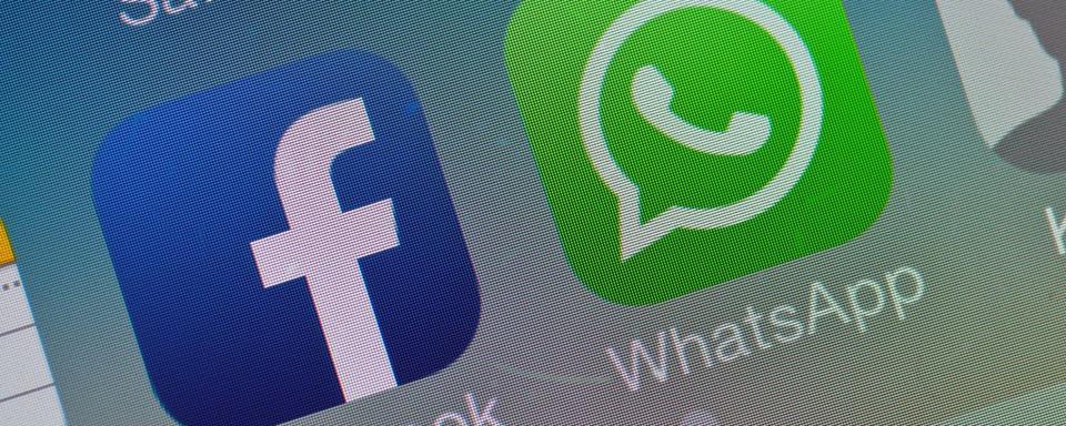 Facebook a racheté Whatsapp en 2014. [EPA/Keystone - Patrick Pleul]