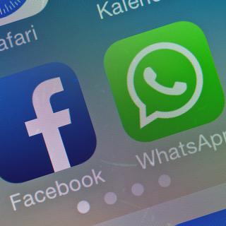 Facebook a racheté Whatsapp en 2014. [EPA/Keystone - Patrick Pleul]