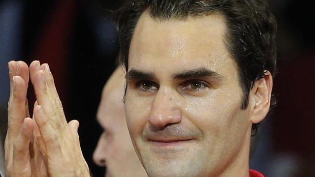 Toute l'émotion sur le visage et dans les yeux de Roger Federer. [Christophe Ena]