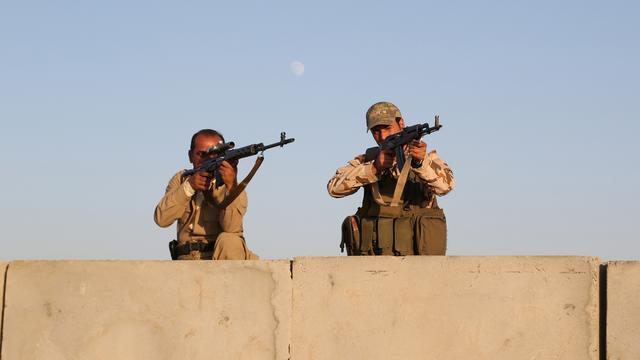 Les combattants kurdes, appelés peshmergas, reçoivent déjà des armes américaines. [Khalid Mohammed]