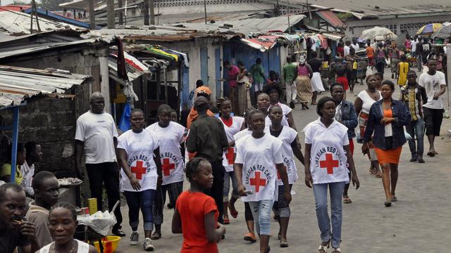 Des membres de la Croix rouge au Liberia, région fortement touchée par le virus Ebola. [Abbas Dulleh - AP Photo]