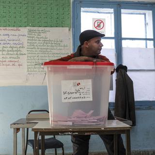 Les Tunisiens élisent leur président. [AP Photo/Keystone - Ilyess Osmane]