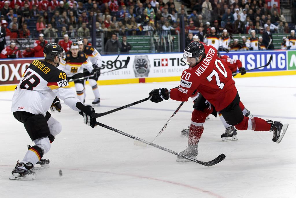 Denis Hollenstein a inscrit son 2e but du tournoi. [KEYSTONE - Salvatore Di Nolfi]