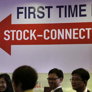 "Stock Connect" unit les Bourses de Hong Kong et de Shanghai pour donner naissance à l'une des plus grandes places financières au monde. [AP Photo/Vincent Yu]