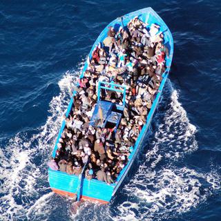 Les sauvetages de migrants au large de Lampedusa sont fréquents. Ici le 22 janvier 2014. [Keystone - Italian Navy]