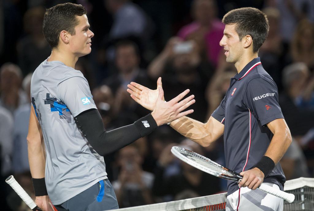 "Djoko" a écrasé Raonic (à g.), qui disputait à 23 ans sa 2e finale dans un Masters 1000. [KEYSTONE - Michel Euler]