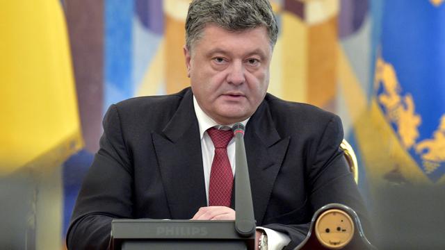 Le président ukrainien Petro Porochenko jeudi lors d'une séance du conseil de sécurité et de défense. [Nikolay Lazarenko/RIA Novosti]