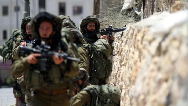 L'armée israélienne a mené une vaste opération à Hébron, pour retrouver trois Israéliens enlevés jeudi soir. [Anadolu Agency/AFP - Shadi Hatem]