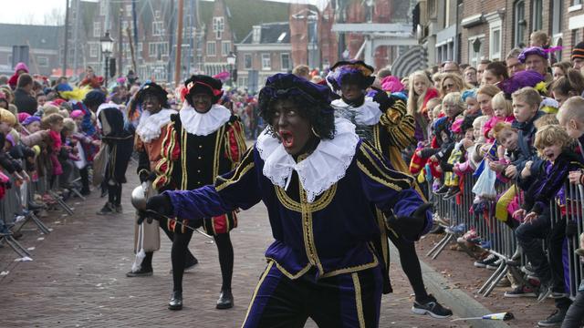 Le Père Fouettard - Zwarte Piet - lors du défilé à Amsterdam en 2013. [AP/Keystone - Peter Dejong]