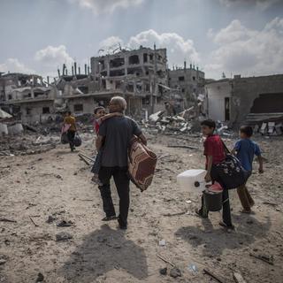 Les habitants de la bande de Gaza retrouvent des lieux sinistrés. [EPA/Olivier Weiken]