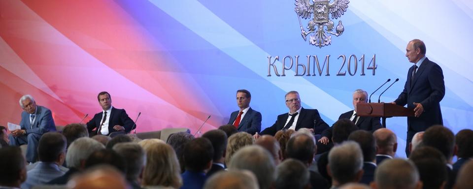 Vladimir Poutine, lors de son allocution en Crimée. [(AP Photo/Sergei Chirikov]