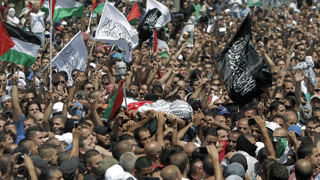 Un jeune Palestinien a été tué dans la nuit de mardi à mercredi probablement en représailles à l'assassinat de trois étudiants israéliens. [Ahmad Gharabli]