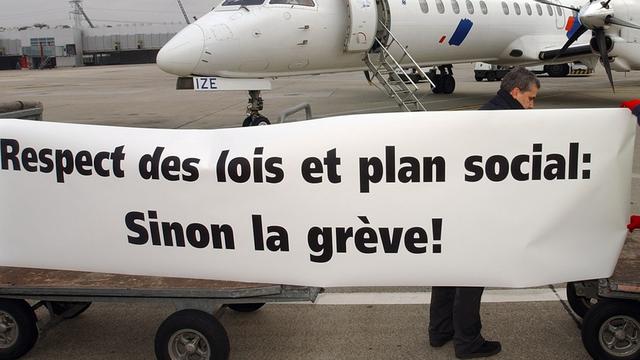 La révision de la loi avait commencé après la faillite de l'ancienne compagnie aérienne Swissair. [Laurent Gilliéron]