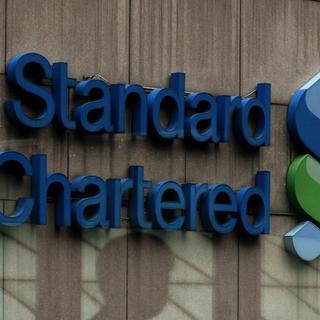 Standard Chartered avait annoncé en février dernier qu'elle voulait vendre sa filiale suisse. [AP Photo/Kin Cheung]