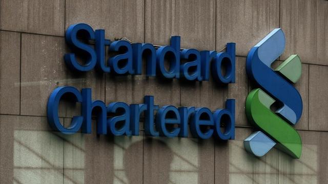 Standard Chartered avait annoncé en février dernier qu'elle voulait vendre sa filiale suisse. [AP Photo/Kin Cheung]