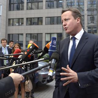 Pour David Cameron, l'UE est devenue trop grosse. Il s'exprime ici lors du sommet européen mardi soir. [AP Photo/Eric Vidal]