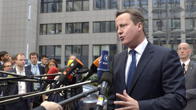 Pour David Cameron, l'UE est devenue trop grosse. Il s'exprime ici lors du sommet européen mardi soir. [AP Photo/Eric Vidal]