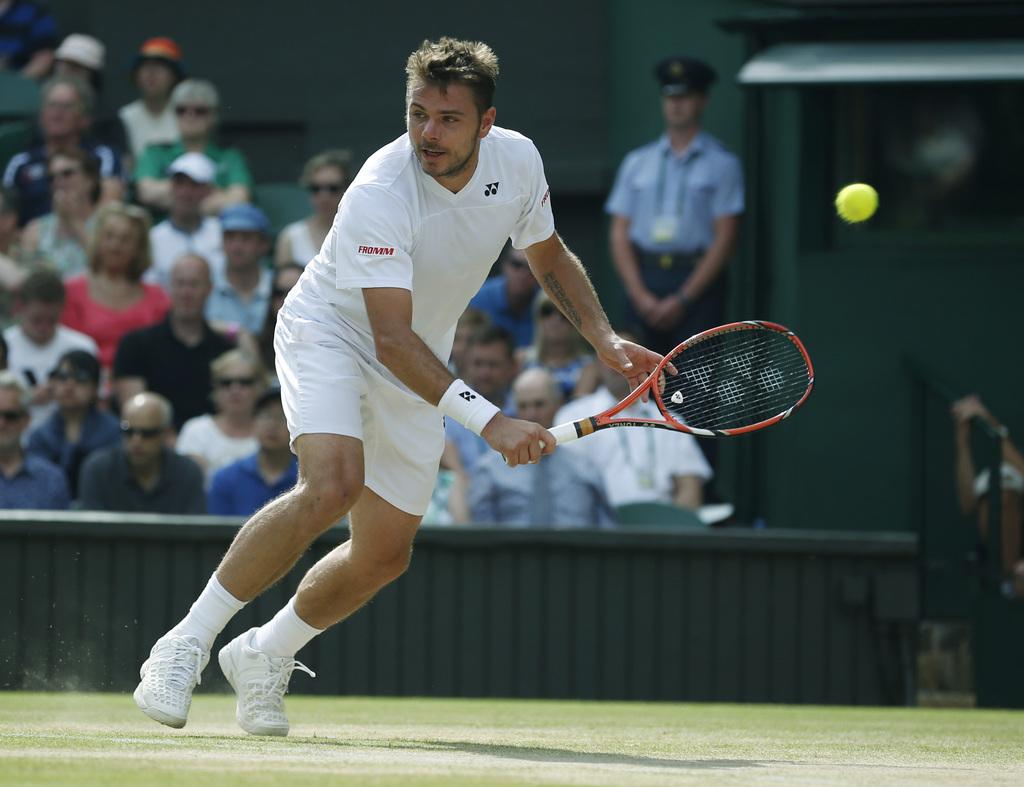 Wawrinka a manqué de fraîcheur pour son 1er quart à Wimbledon. [KEYSTONE - Golovkin]