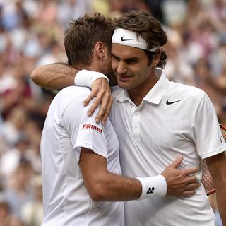 2 juillet 2014: Federer bat Wawrinka 3-6 7-6 6-4 6-4 en quart de finale de Wimbledon. [Toby Melville]