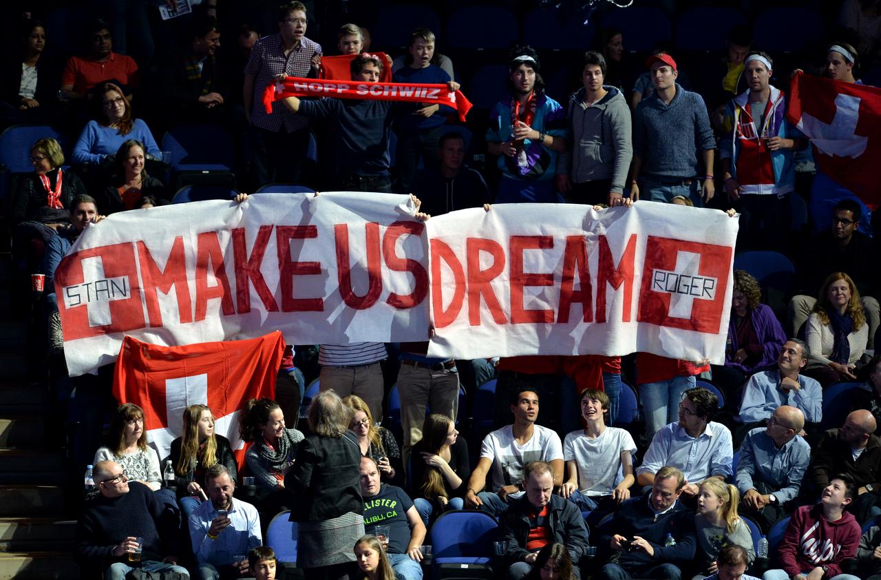 Les fans des deux joueurs suisses en auront pour leur argent demain dans l'arène londonienne. [AFP - Glyn Kirk]