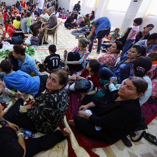 De nombreux chrétiens d'Irak ont dû quitter leur village suite à l'avancée des djihadistes. [AP Photo]
