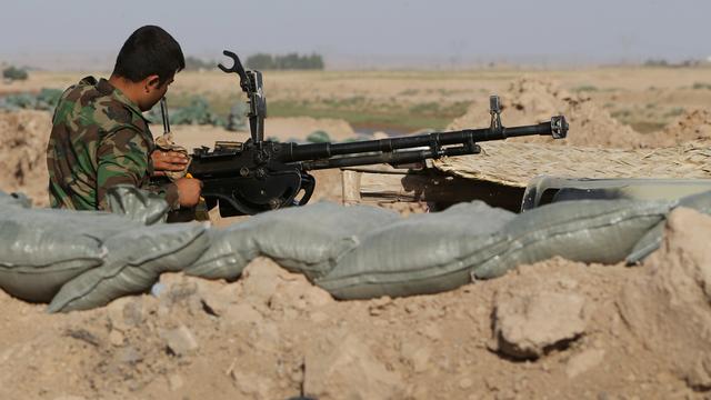 Irak armes [AP Photo/Hussein Malla]