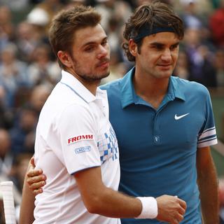 30 mai 2010: Federer bat Wawrinka 6-3 7-6(5) 6-2 en huitièmes de finale de Roland Garros pour la première confrontation des deux Suisses en tournoi du Grand Chelem. [AP/Michel Spingler]