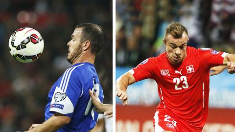 Le joueur de Saint-Marin, Andy Selva, face à Xherdan Shaqiri pour l'équipe de Suisse