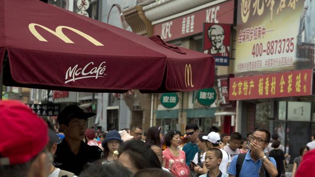 Le leader mondial du fast-food cède toujours plus ses restaurants en franchise. [AP/Keystone - Ng Han Guan]