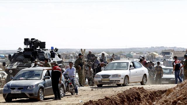 Ces derniers jours, des dizaines de milliers de Kurdes ont vers la Turquie face à l'avancée de l'Etat islamique dans le nord de la Syrie. [EPA/Sedat Suna]