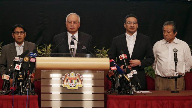 Le Premier ministre malaisien a annoncé que le Boeing de la Malaysia Airlines MH370 a terminé sa course l'océan Indien. [EPA/Keystone - Ahmad Yusni]