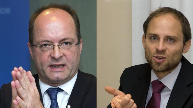 Le sortant Olivier Jornot (à gauche) et l'avocat Pierre Bayenet (à droite) s'affrontent pour le poste de procureur général à Genève. [Salvatore Di Nolfi]