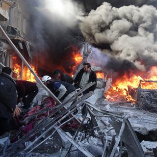 Image prise le 1er février lors d'un raid aérien sur la ville d'Alep, dans le nord de la Syrie. [Mohammed Al-khatieb]