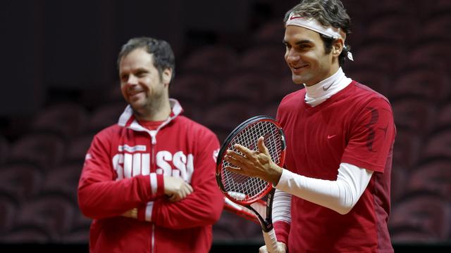 Federer a réussi a redonner le sourire à son capitaine Lüthi. [Salvatore Di Nolfi]