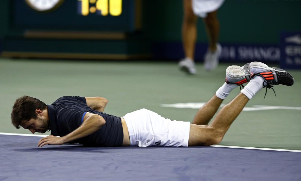 Solide à l'échange, Simon a finalement chuté face au "Maître". [REUTERS - Aly Song]