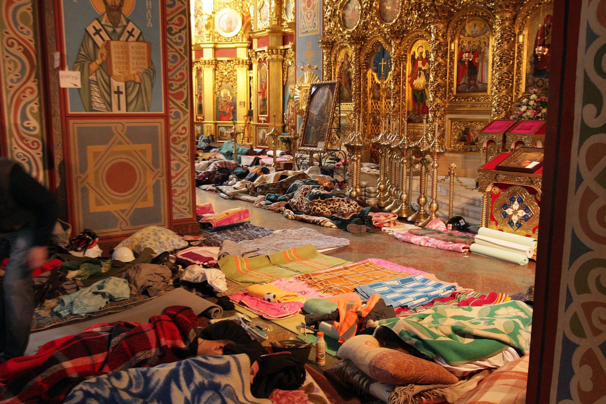 La cathédrale Mykhaylo a été transformée en hôpital pour accueillir les manifestants blessés durant les violences sur la place de l'Indépendance à Kiev. [AFP - ANATOLII BOIKO]