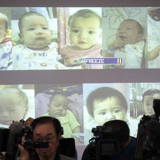Ces neuf bébés pourraient être nés de mères porteuses, selon la police thaïlandaise. [Athit Perawongmetha]