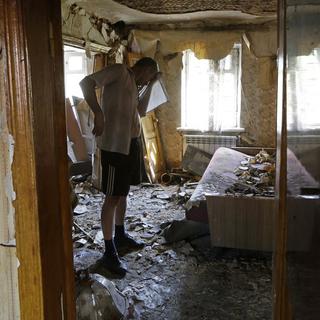 Donetsk est sous le feu des bombes. [AP Photo/Sergei Grits]